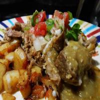Slow cooked pork smothered in Tomatillo Salsa_image