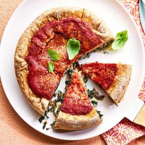 Spinach-stuffed pizza pies image