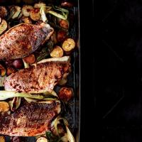 Baked Snapper with Harissa, New Potatoes, and Spring Onions image