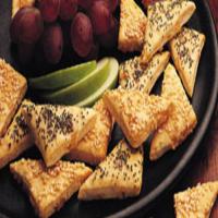 Beer-Cheese Triangles with Zesty Cheese Sauce image