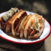 Split Hot Dogs with Butter-Toasted Buns and Homemade Toppings image