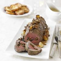 Roast fillet of beef with mushroom stuffing image