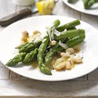 Sautéed asparagus, toasted almonds & manchego cheese image
