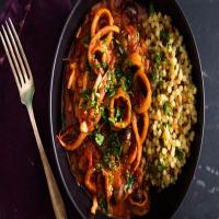 Braised Squid With Tomato, Harissa, and Olives Recipe_image