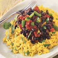 Yellow Rice Salad with Roasted Peppers and Spicy Black Beans image