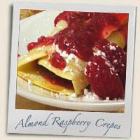 Crepes with Lemon/ Raspberry Sauce image