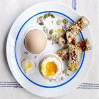Dippy eggs with Marmite soldiers image