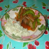 Tangerine Stir-Fried Beef With Onions and Snow Peas image