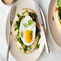 Indian-Spiced Eggs With Spinach and Turmeric Yogurt image