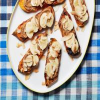 Sweet Potato Toast with Almond Butter, Banana and Toasted Coconut Chips image