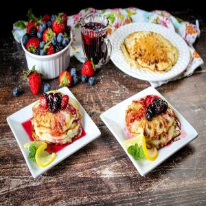 Cheesecake Pancakes With Berry-Lemon Syrup image