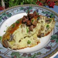Souffle Omelet With Brie Mushrooms and Onions image