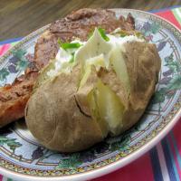 Baked Potatoes in Their Jackets With Sour Cream Topping_image