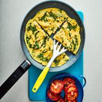 Herb omelette with fried tomatoes image