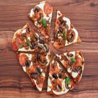 Meaty Grilled Pizza with Caramelized Onions and Mushrooms image
