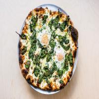 Breakfast Pizza with Sausage, Eggs, Spinach, and Cream image