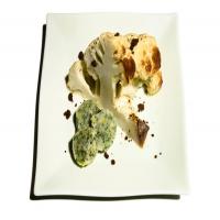 Whole Roasted Cauliflower With Black-Garlic Crumble and Parsley-Anchovy Butter_image