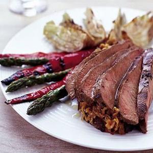 Marinated barbecue lamb with shallot marmalade, served with griddled vegetables image