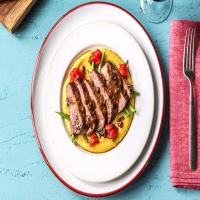 New York Strip Steak With Balsamic Reduction over Polenta, Blistered Tomatoes, and Green Beans_image