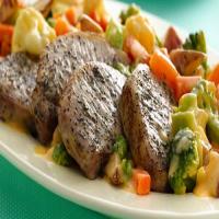 Roasted Pork Chops with Cheesy Vegetables image