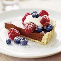 Chocolate tart with crème fraîche & raspberries image
