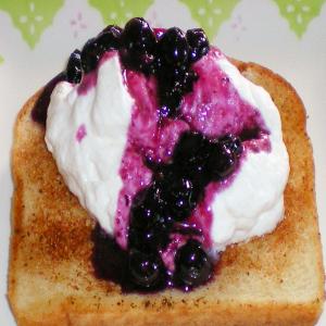 Bread Fritters With Custard and Blueberries image