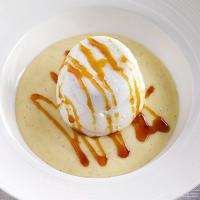 Floating islands with caramel sauce image