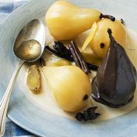 Spiced poached pears in chocolate sauce image
