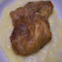 Cider Braised Chicken over Smoked Cheddar Grits_image