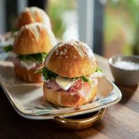 Homemade Pretzel Buns with Butter and Ham image