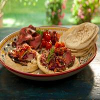 Open-Faced Pitas with Rotisserie Lamb with Pomegranate and Mint, Grilled Tomatoes, and Greek Slaw_image