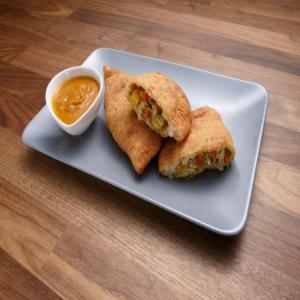 Curried Crab-Mango Pocket Pies and Hot Sauce image