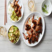 Korean-Inspired Grilled Wings With Cucumber-Kimchi Salad image