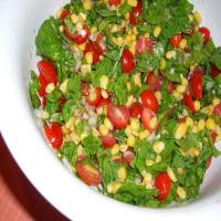 Arugula, Fresh Corn and Tomato Salad image