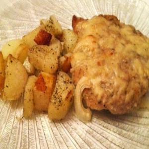 Onion smothered breaded Pork with mustard sauce_image