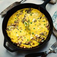 Wild Mushroom Frittata with Cheddar, Green Onions, and Peas image