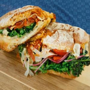 Broccoli Rabe and Peppers Panini with Cheese and Hot Honey image