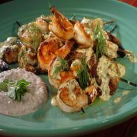 Grilled Shrimp Skewers with Mustard-Dill Dressing and Black Olive Yogurt Sauce image