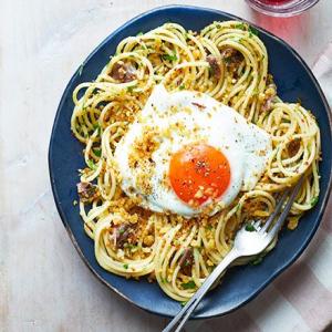 Spaghetti with smoked anchovies, chilli breadcrumbs & fried egg image