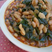 Braised Cannellini Beans With Onions and Arugula image