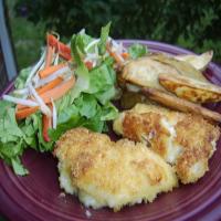 Crumbed Chicken With Potato Wedges image
