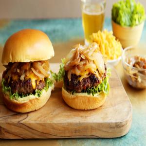 Canadian Burger With Beer-Braised Onions and Cheddar image