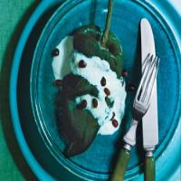 Stuffed Poblano Chiles with Walnut Sauce and Pomegranate Seeds image