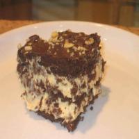 Frosted Peanut Butter Chocolate Eclair Cake image