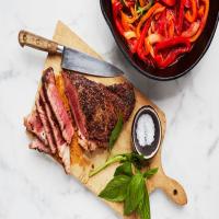 Seared Strip Steaks with Braised Peppers and Onion image