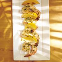 Shrimp Kebabs with Lemon Wedges and Cilantro image