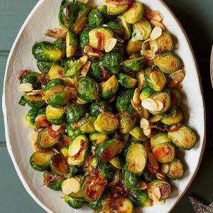 Butter-fried sprouts with crispy shallots & almonds image