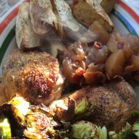 Braised Chicken Thighs with Apples, Bacon Chutney, and Roasted Red Potatoes image