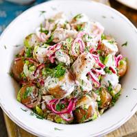 Red & white potato salad with pickled onions image