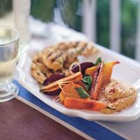 Roasted Beets and Carrots with Cumin Vinaigrette, Chickpea Purée, and Flatbread image